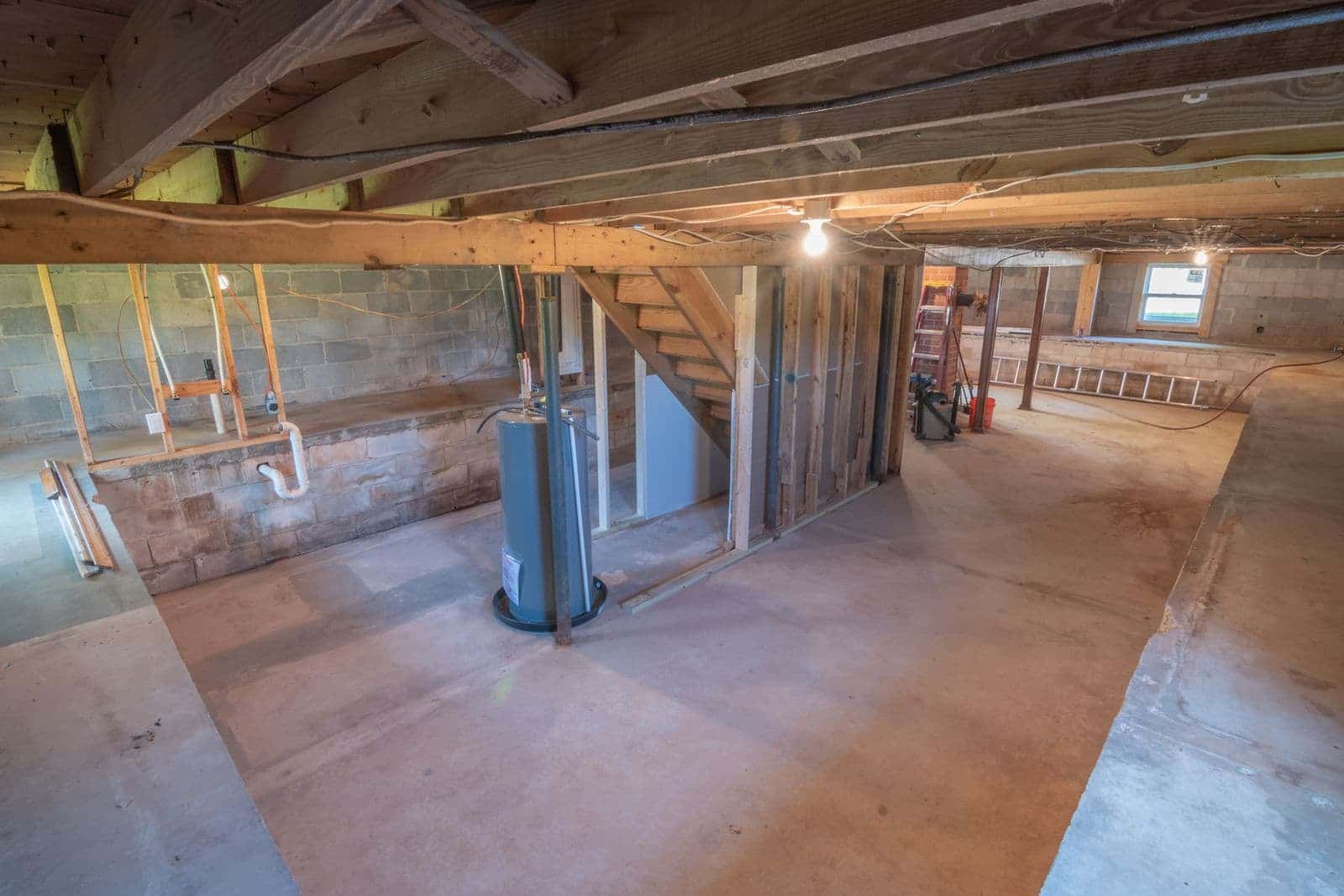 Tank water heater in a basement utility area