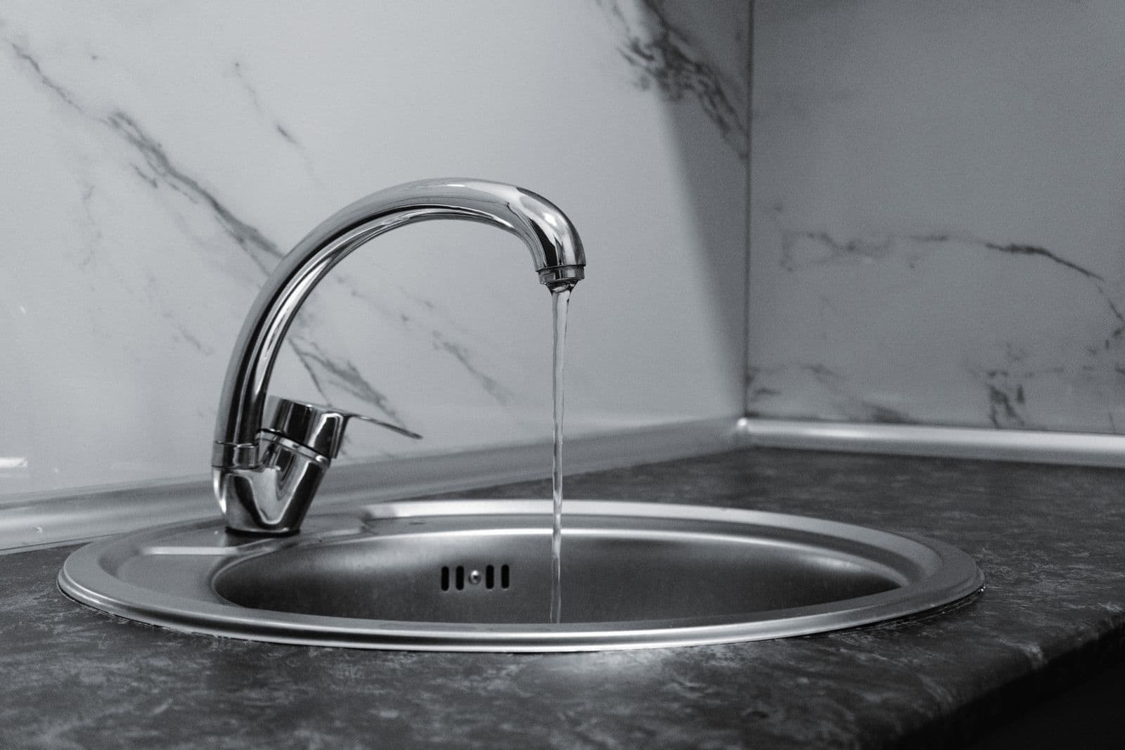 Water running from a kitchen faucet